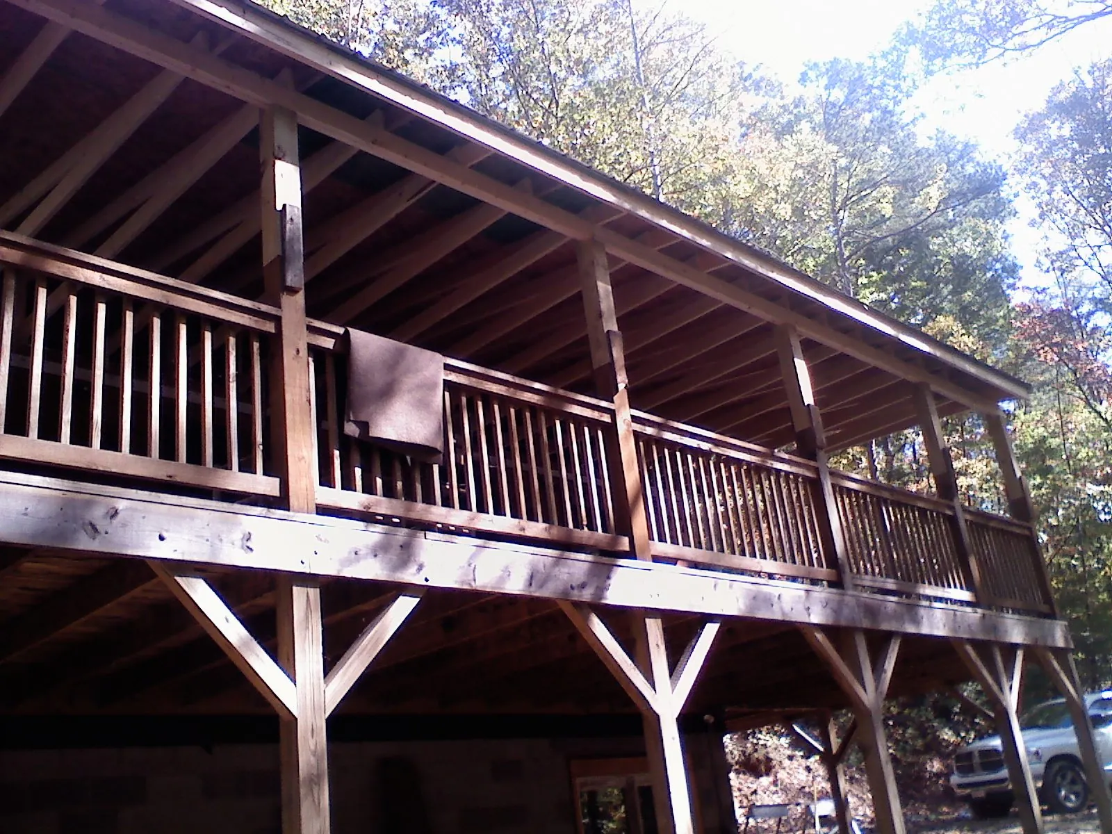 Timber framing under a new elevated porch and deck — Roof Leak Repair in Alamosa by Roofing Brothers